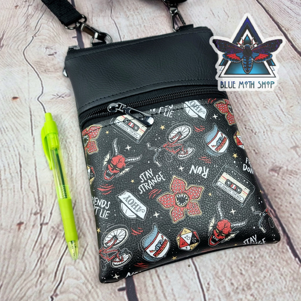 Stay Strange Faux Leather Crossbody Phone Bag