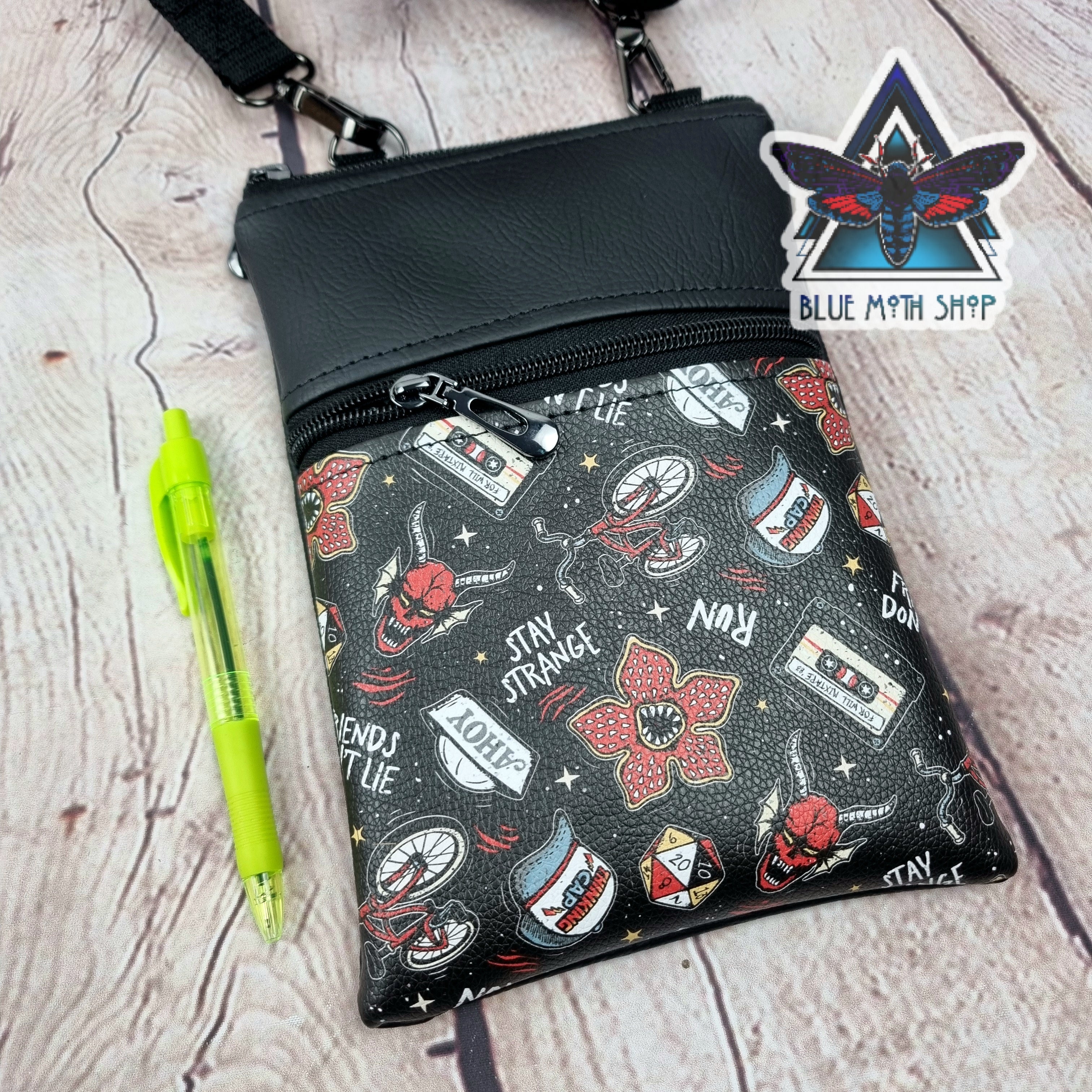 Stay Strange Faux Leather Crossbody Phone Bag